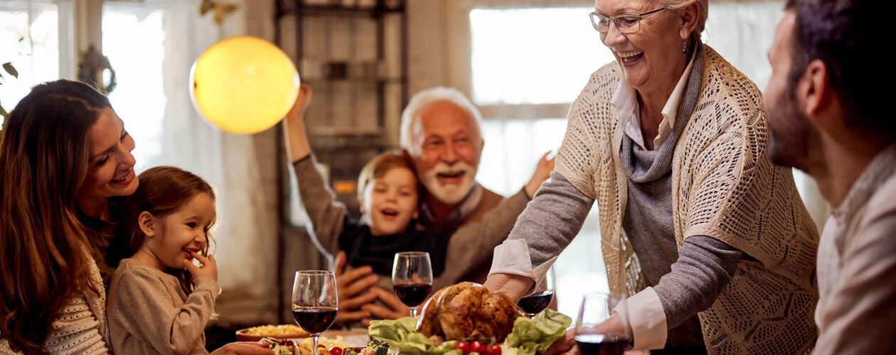 Family eating a celebratory meal together
