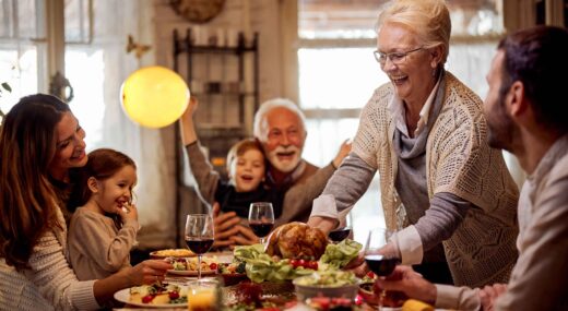 Family eating a celebratory meal together