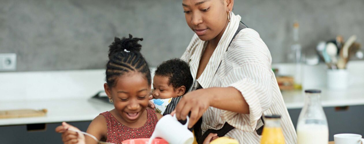 Mom in kitchen with kids
