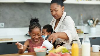 Mom in kitchen with kids