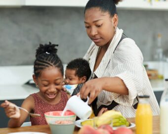 Mom in kitchen with kids