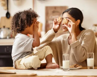 mom and son eating cookies together