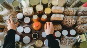 Person organizing different types of food packages