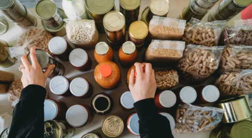 Person organizing different types of food packages